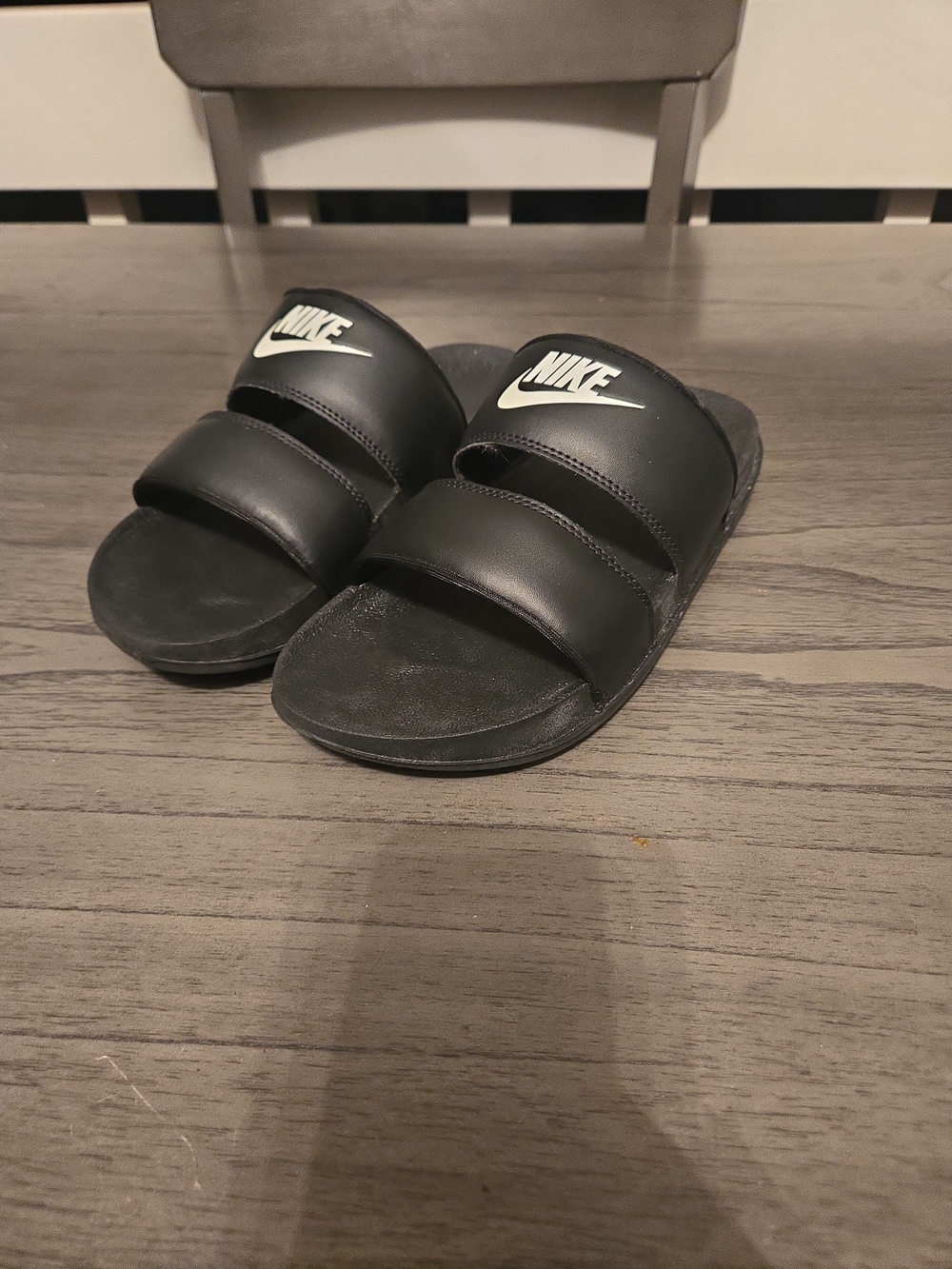Nike Black Slide Sandals with White Swoosh